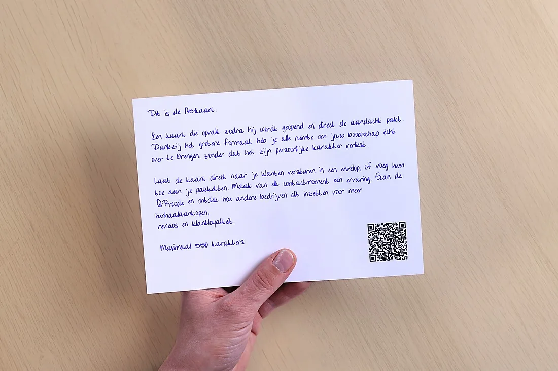 A5 card without an address panel, written with a real pen across the full width