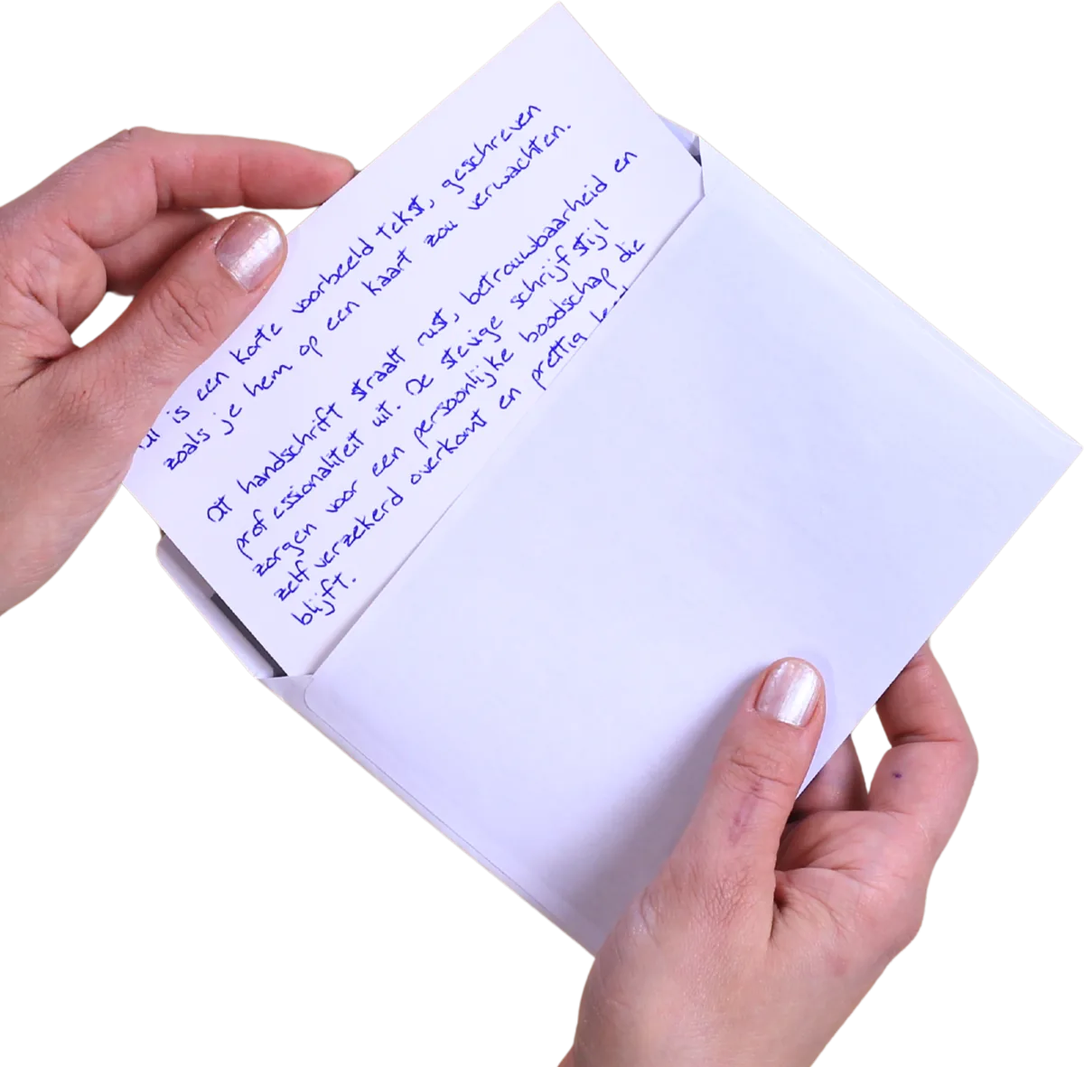 Hand taking a card written with a real pen out of an envelope