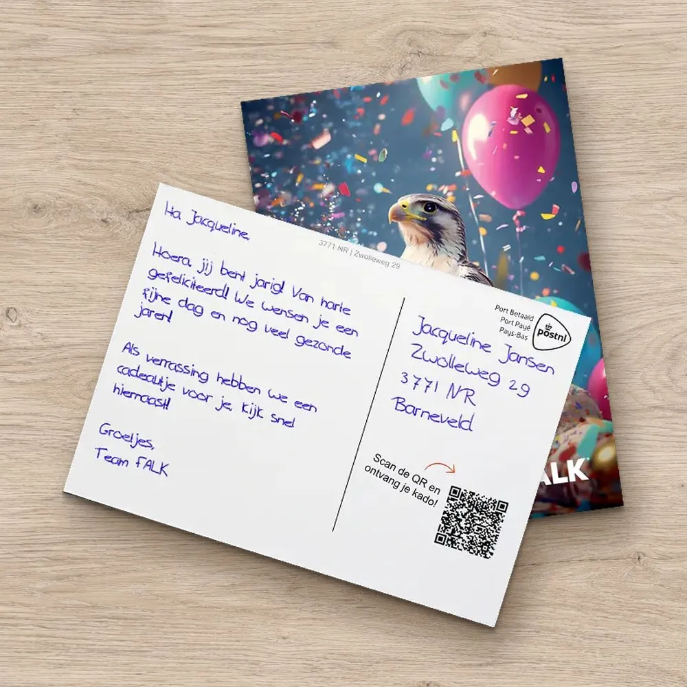 Birthday card with a QR code to a gift of their choice, on a wooden table
